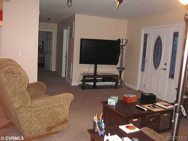 535 Levi Road Green Bay, VA 23942 - Photo 5 of 19 a living room with furniture and a flat screen tv