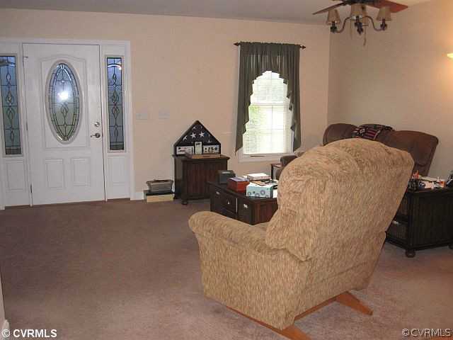 535 Levi Road Green Bay, VA 23942 - Photo 6 of 19 a living room with furniture and a mirror