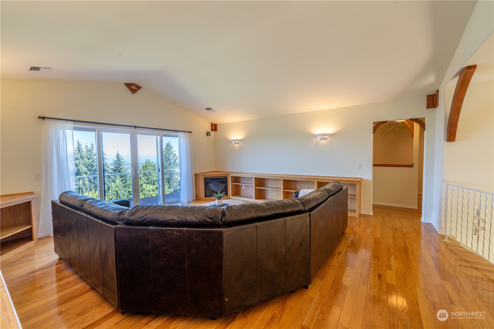 272 Ravens Ridge Road Sequim, WA 98382 - Photo 21 of 40 a living room with furniture and a large window