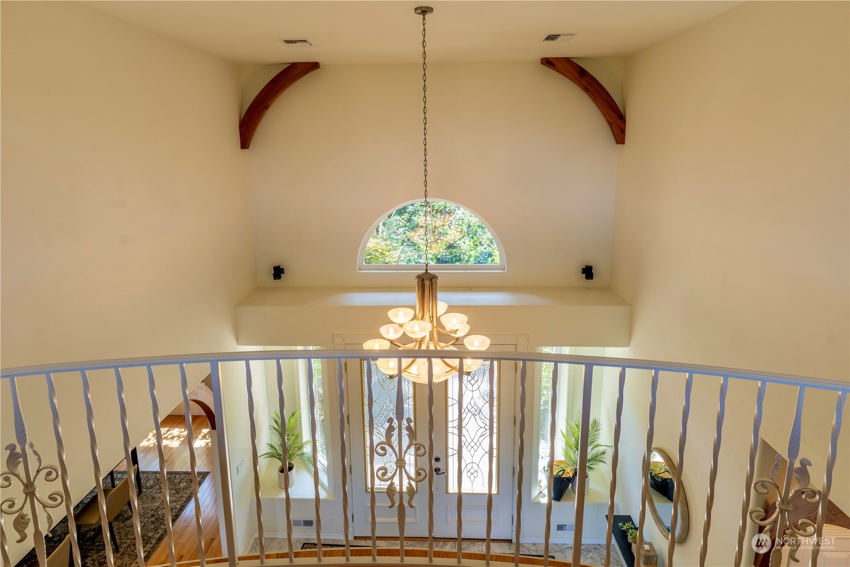 272 Ravens Ridge Road Sequim, WA 98382 - Photo 22 of 40 a very nice looking room with a large window and chandelier