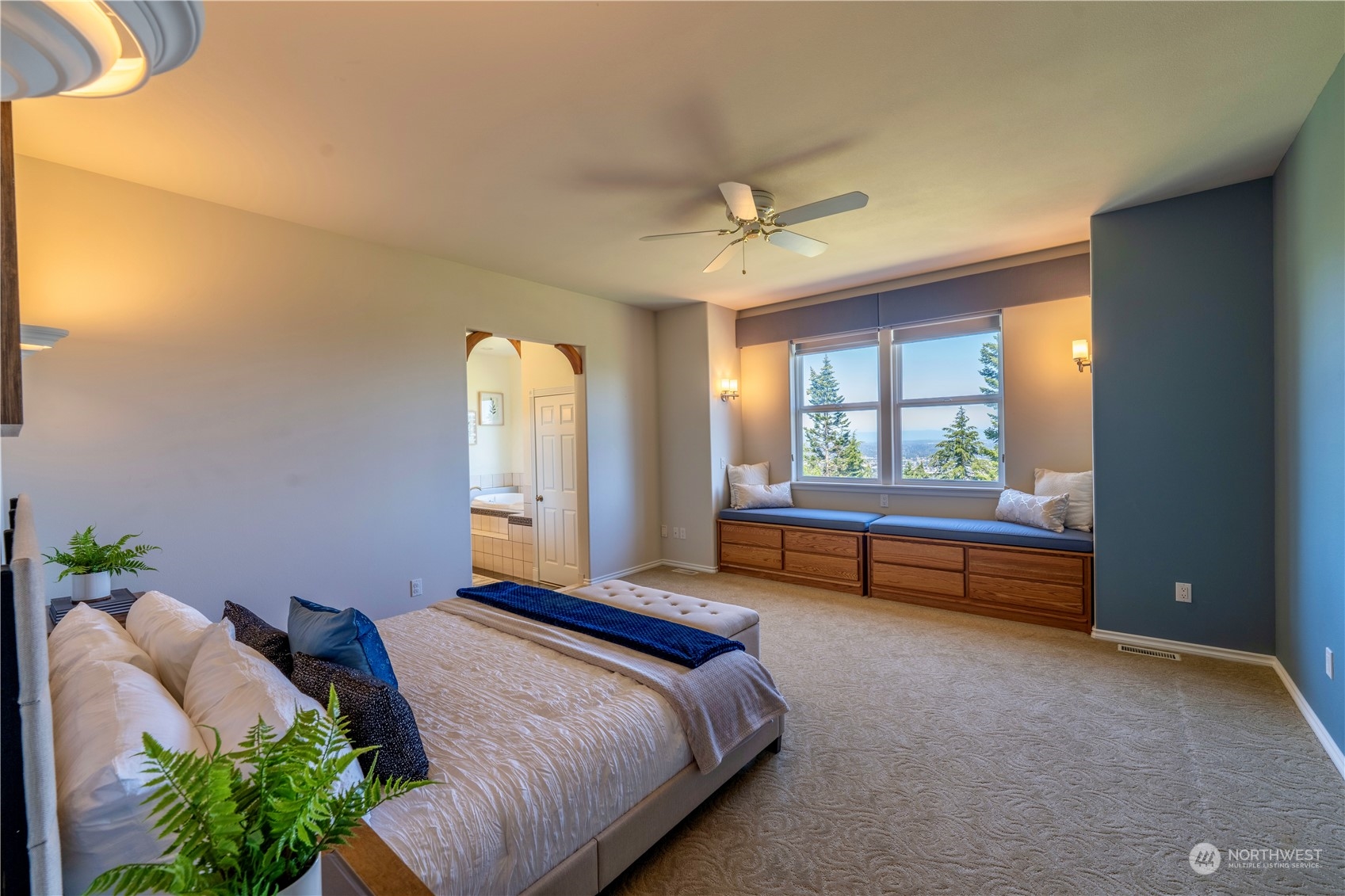 272 Ravens Ridge Road Sequim, WA 98382 - Photo 25 of 40 a bed room with a bed and a window