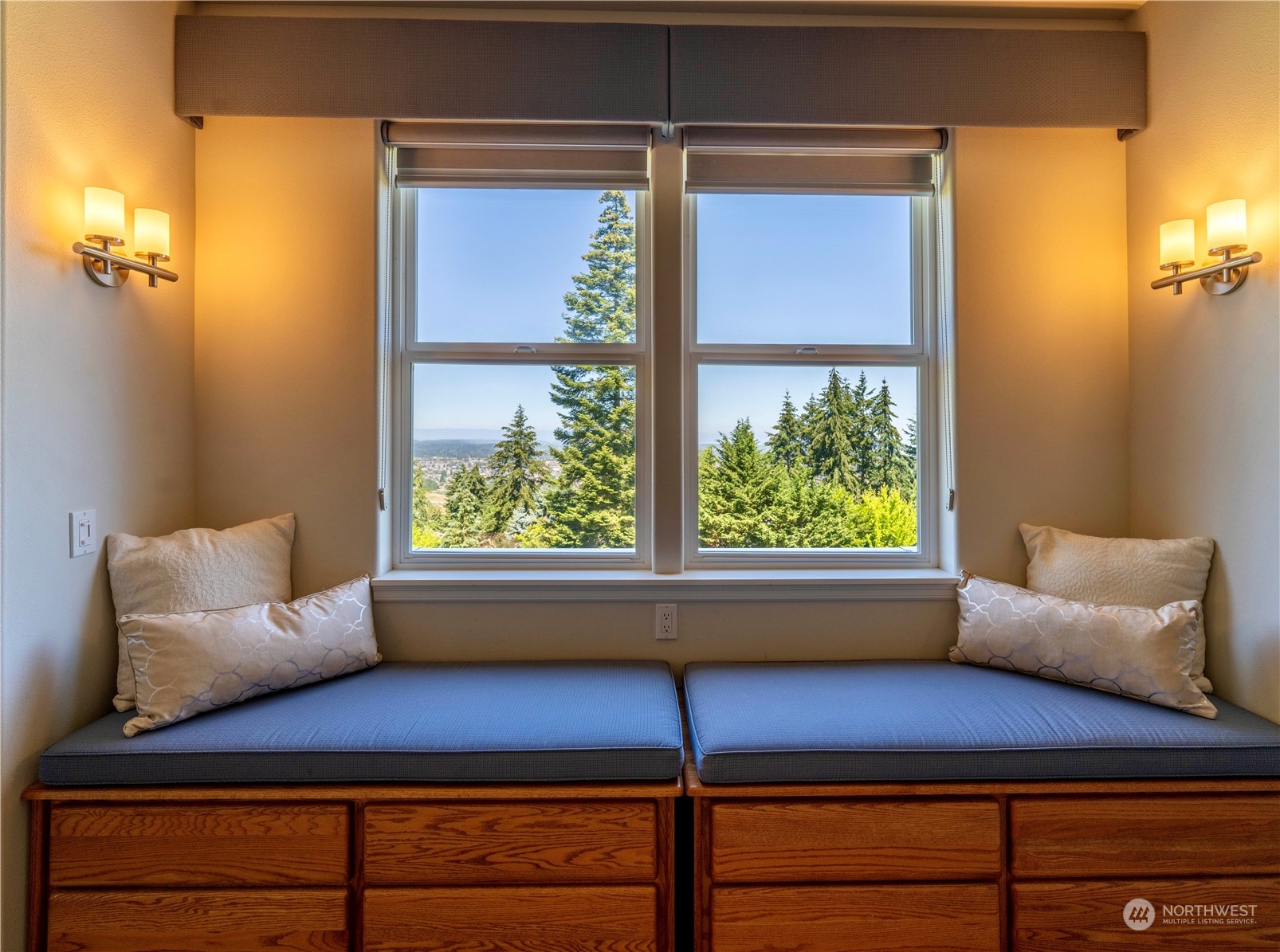 272 Ravens Ridge Road Sequim, WA 98382 - Photo 26 of 40 a wooden bench sitting in front of a window