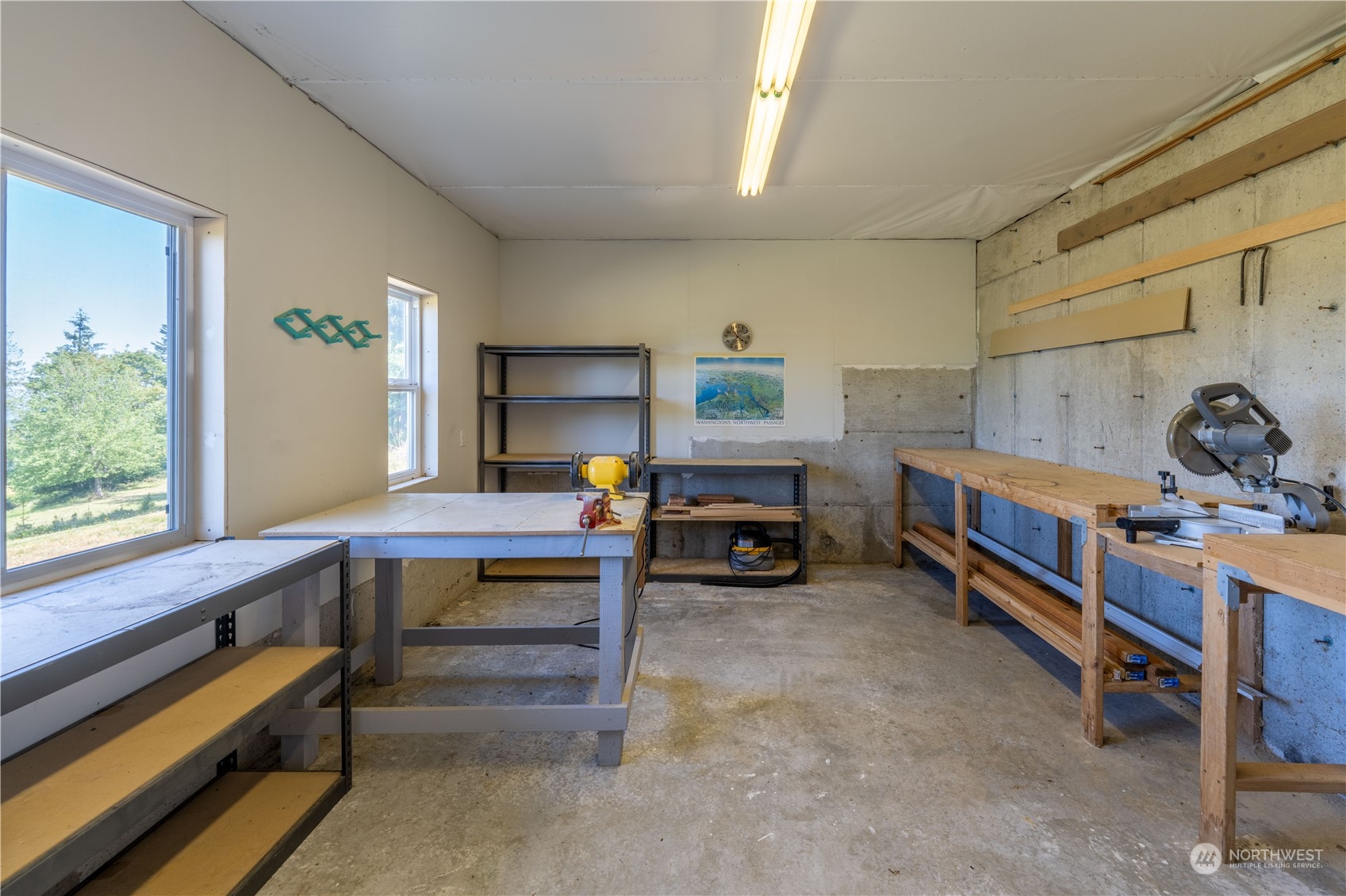 272 Ravens Ridge Road Sequim, WA 98382 - Photo 39 of 40 a room with furniture a bed and a window