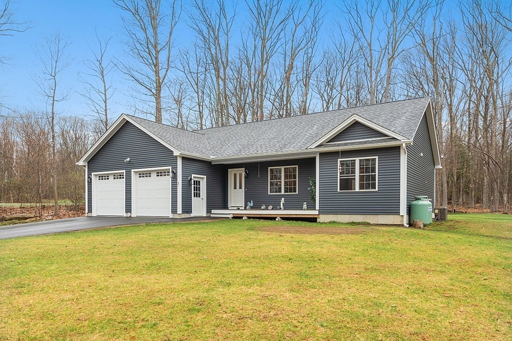 45 Phillipston Road Templeton, MA 01468 - Photo 3 of 33 a front view of a house with a yard