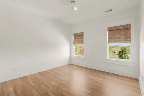 an empty room with windows