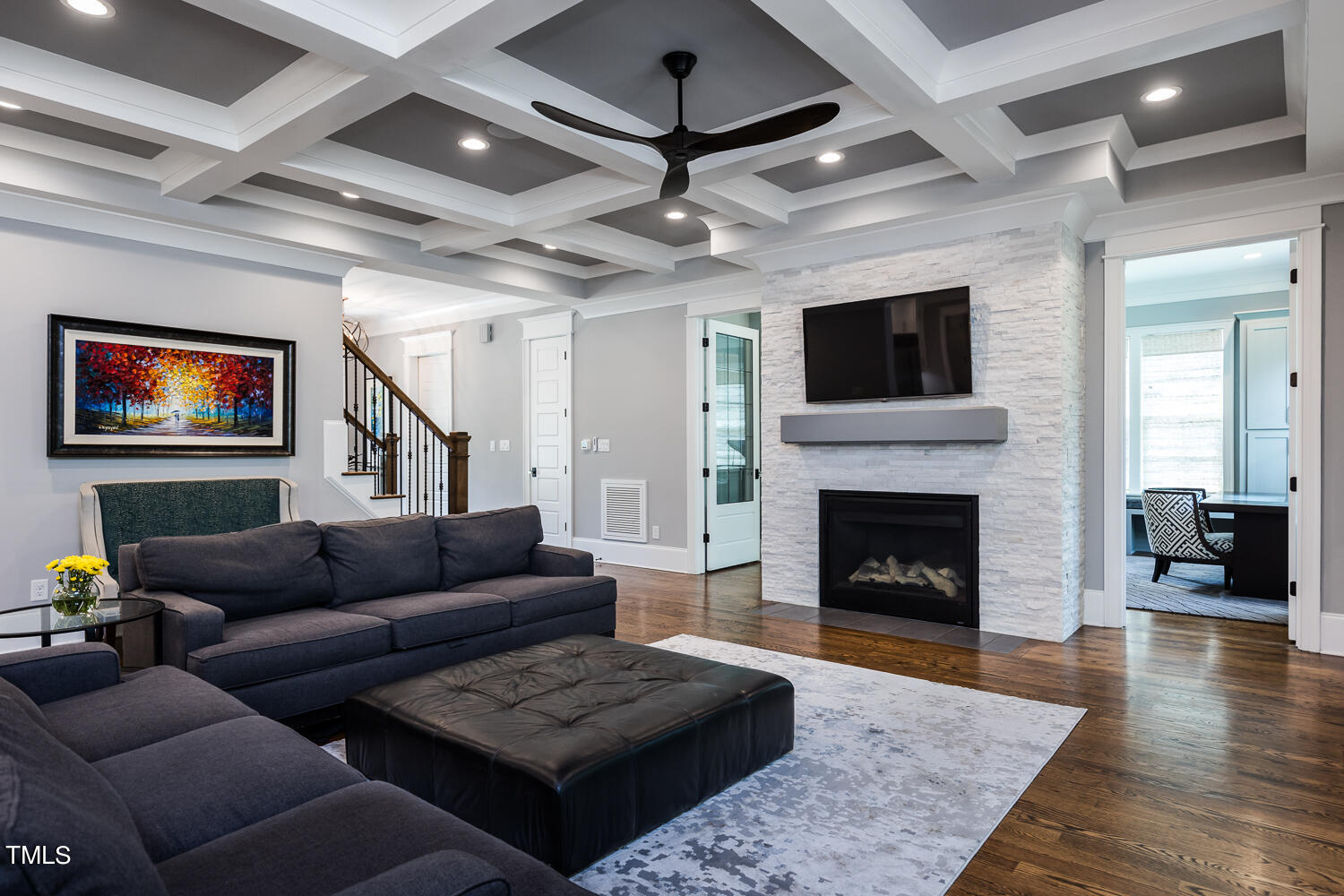 11405 Royal Amber Way Raleigh, NC 27614 - Photo 14 of 61 a living room with furniture and a fireplace