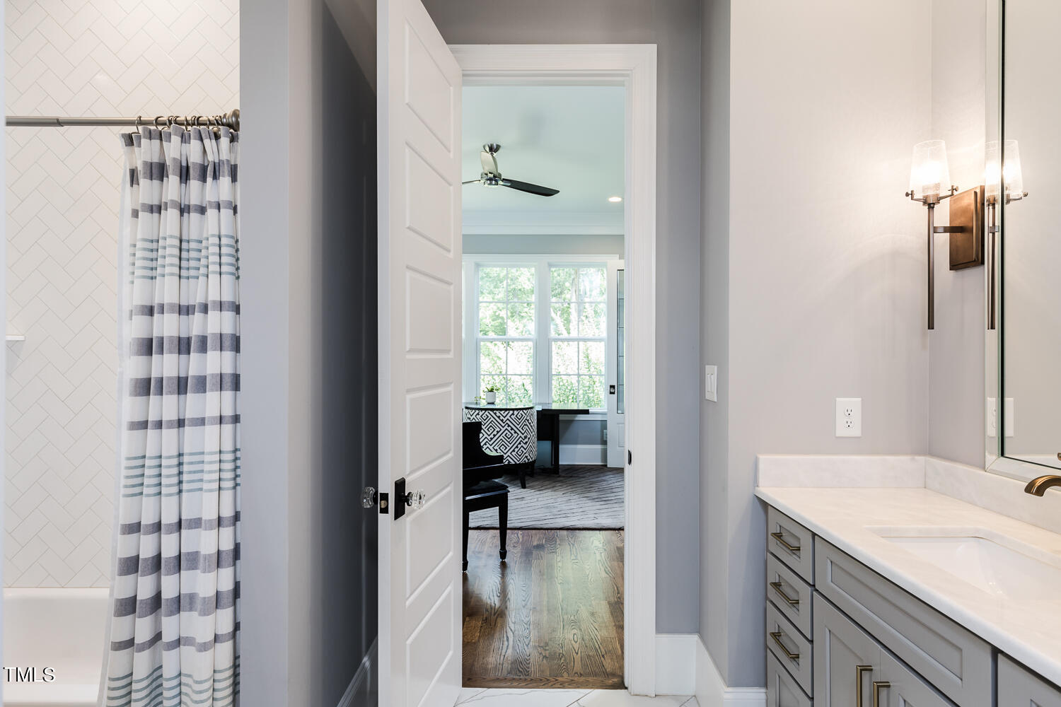 11405 Royal Amber Way Raleigh, NC 27614 - Photo 36 of 61 a en suite bathroom with a granite countertop sink and a mirror