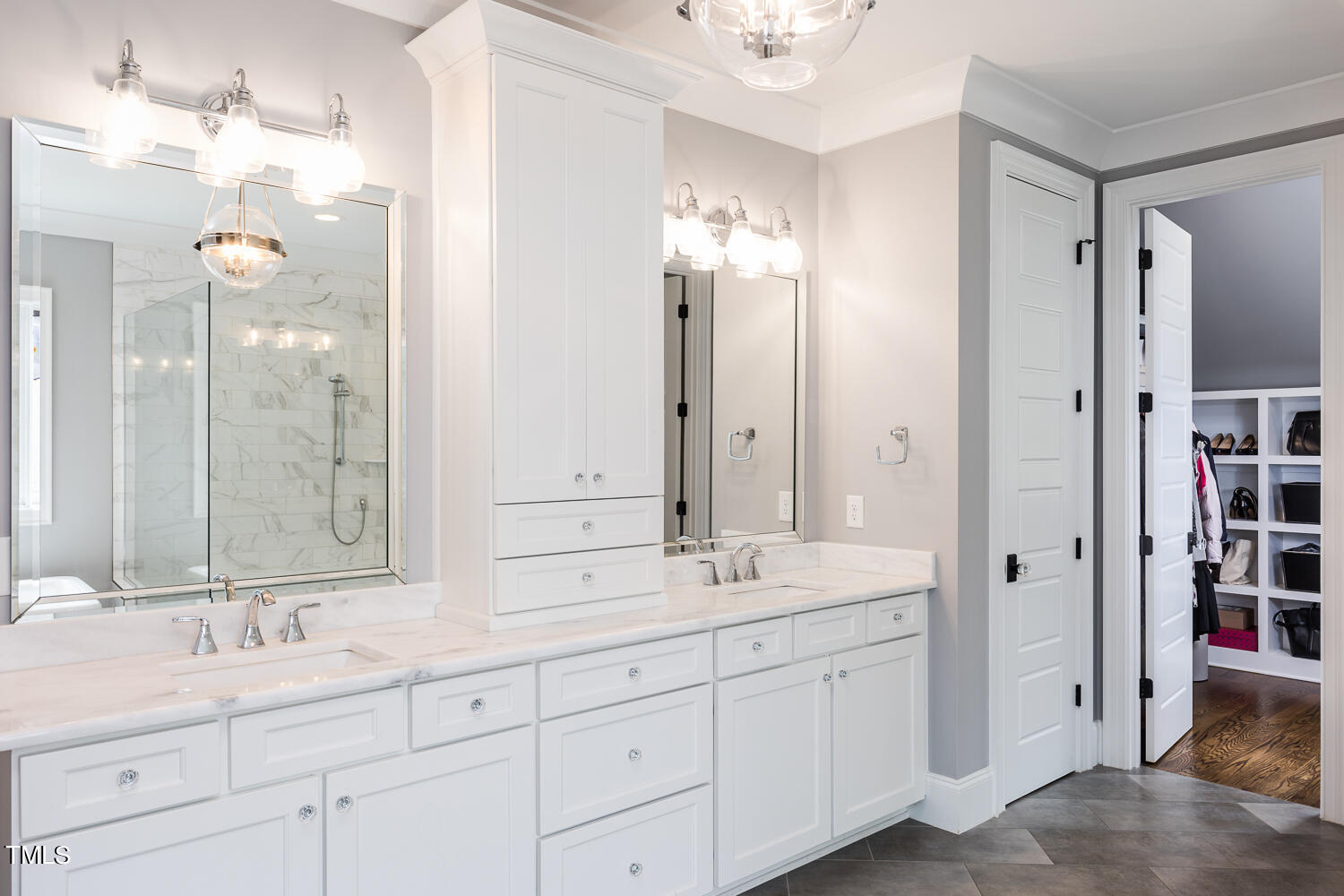11405 Royal Amber Way Raleigh, NC 27614 - Photo 40 of 61 a bathroom with double vanity sinks a mirror and a shower