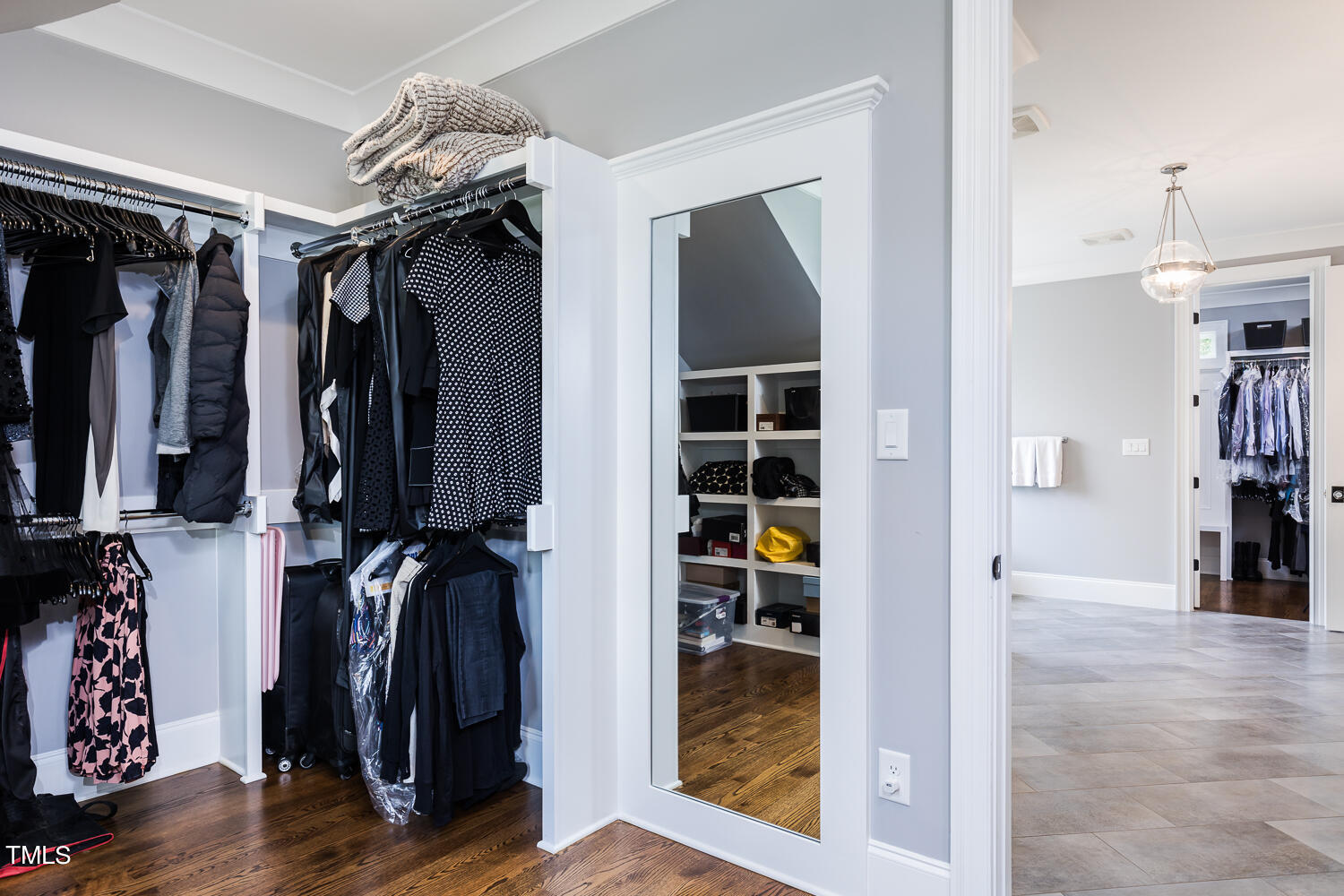 11405 Royal Amber Way Raleigh, NC 27614 - Photo 42 of 61 a view of walk in closet with clothes and shoes