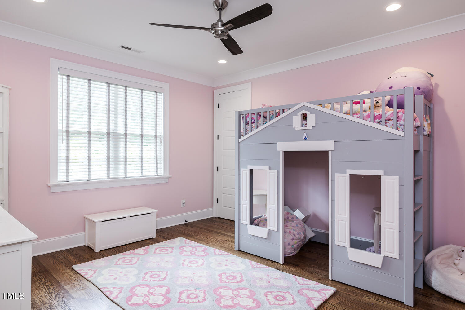 11405 Royal Amber Way Raleigh, NC 27614 - Photo 45 of 61 a bedroom with a bed and wooden floor