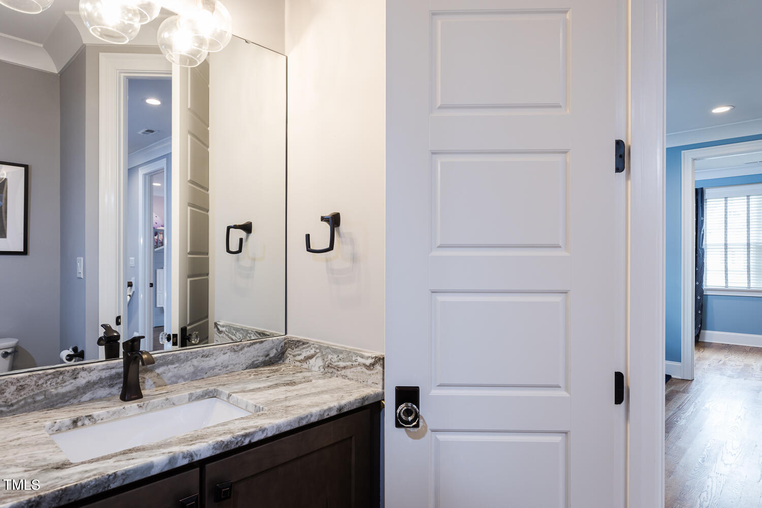 11405 Royal Amber Way Raleigh, NC 27614 - Photo 48 of 61 a bathroom with a granite countertop sink and a mirror