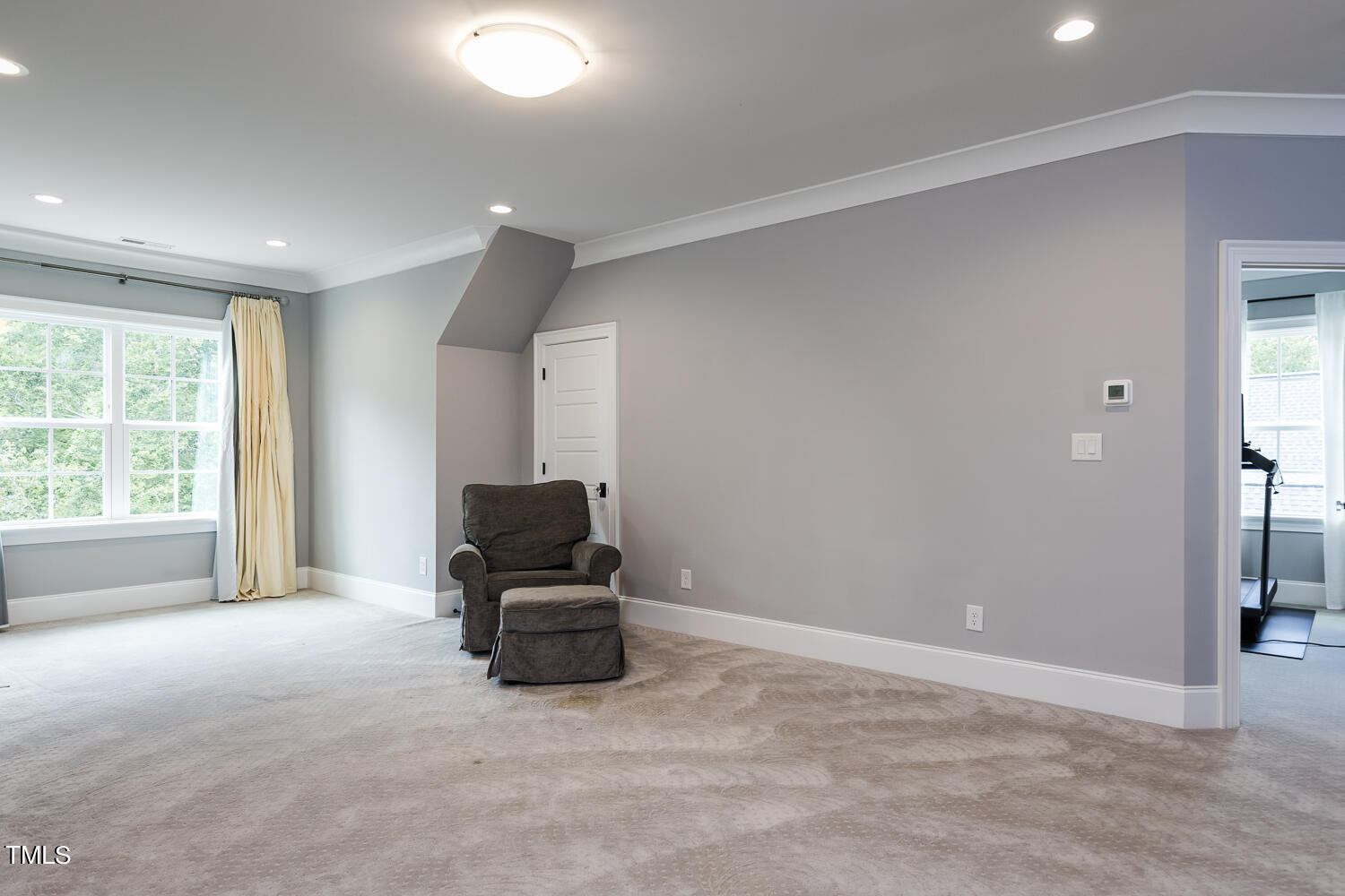 11405 Royal Amber Way Raleigh, NC 27614 - Photo 49 of 61 a room with furniture and large windows