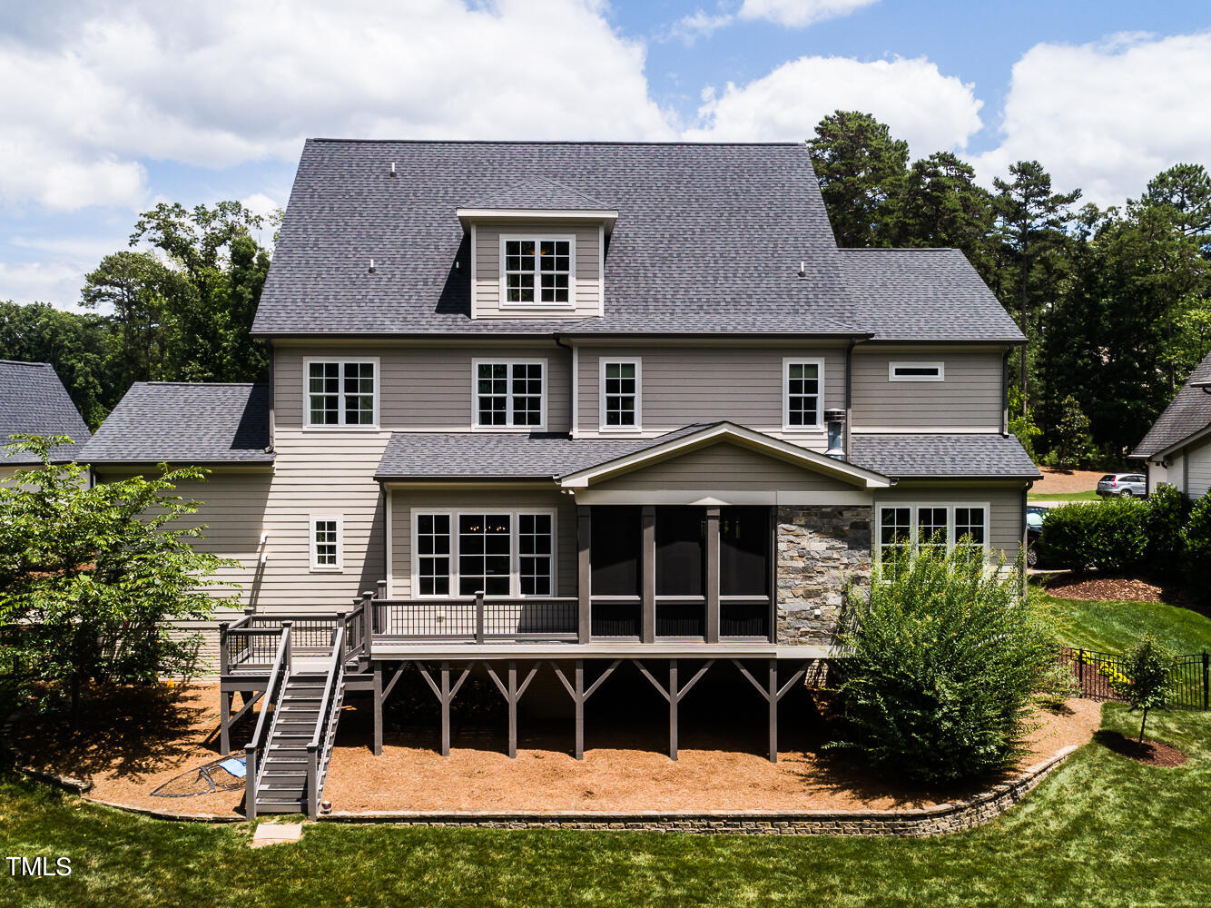 11405 Royal Amber Way Raleigh, NC 27614 - Photo 56 of 61 a front view of a house with a garden