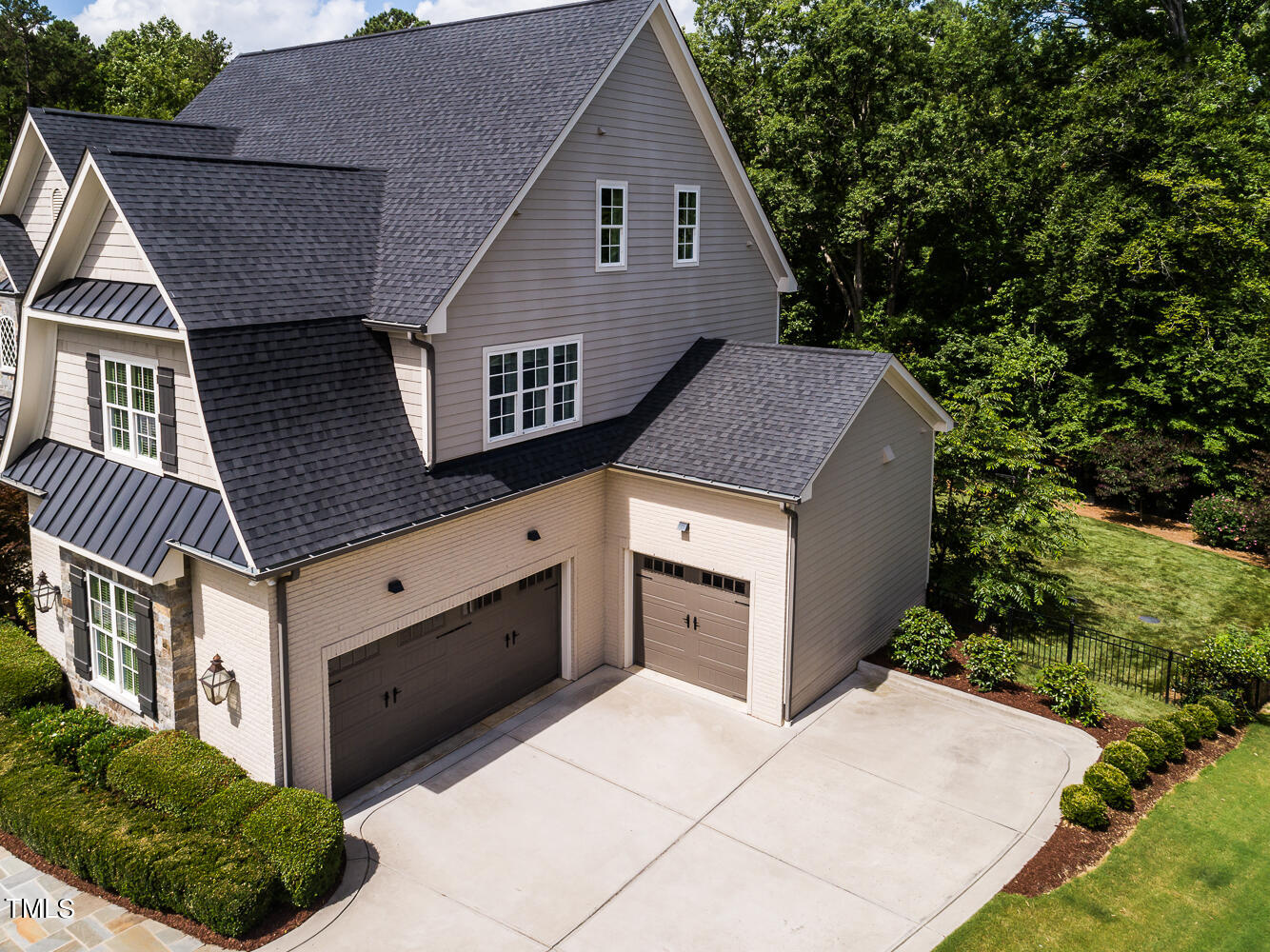 11405 Royal Amber Way Raleigh, NC 27614 - Photo 61 of 61 a view of a house with a yard and garage