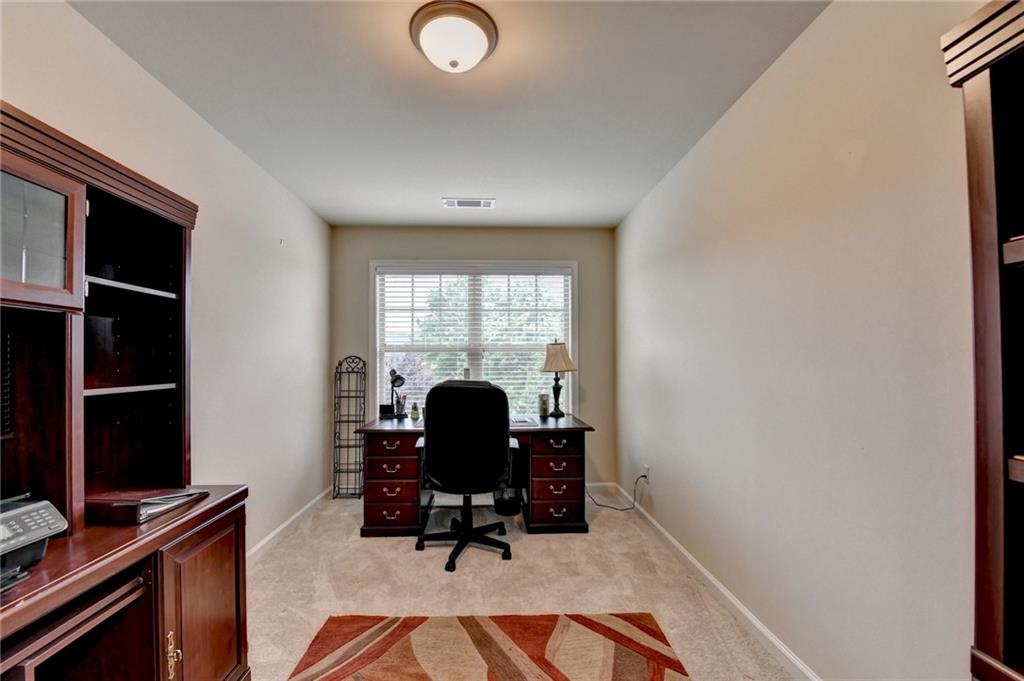 2583 Madison Mae Lane Grayson, GA 30017 - Photo 35 of 43 a view of workspace with windows