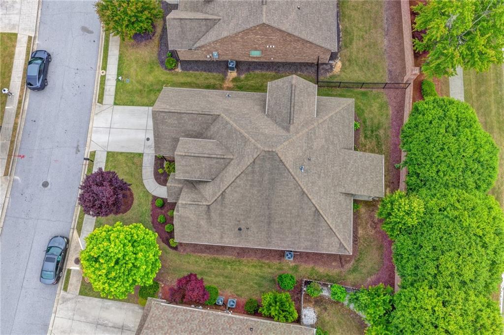 2583 Madison Mae Lane Grayson, GA 30017 - Photo 42 of 43 an aerial view of a house with a yard and potted plants
