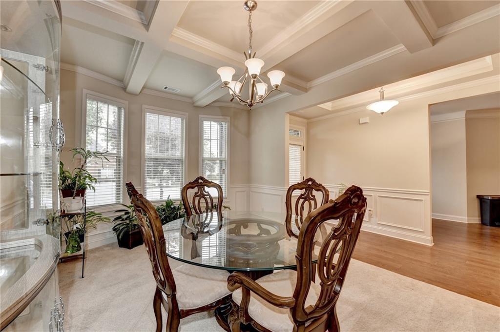 2583 Madison Mae Lane Grayson, GA 30017 - Photo 5 of 43 a view of a dining room with furniture window and outside view