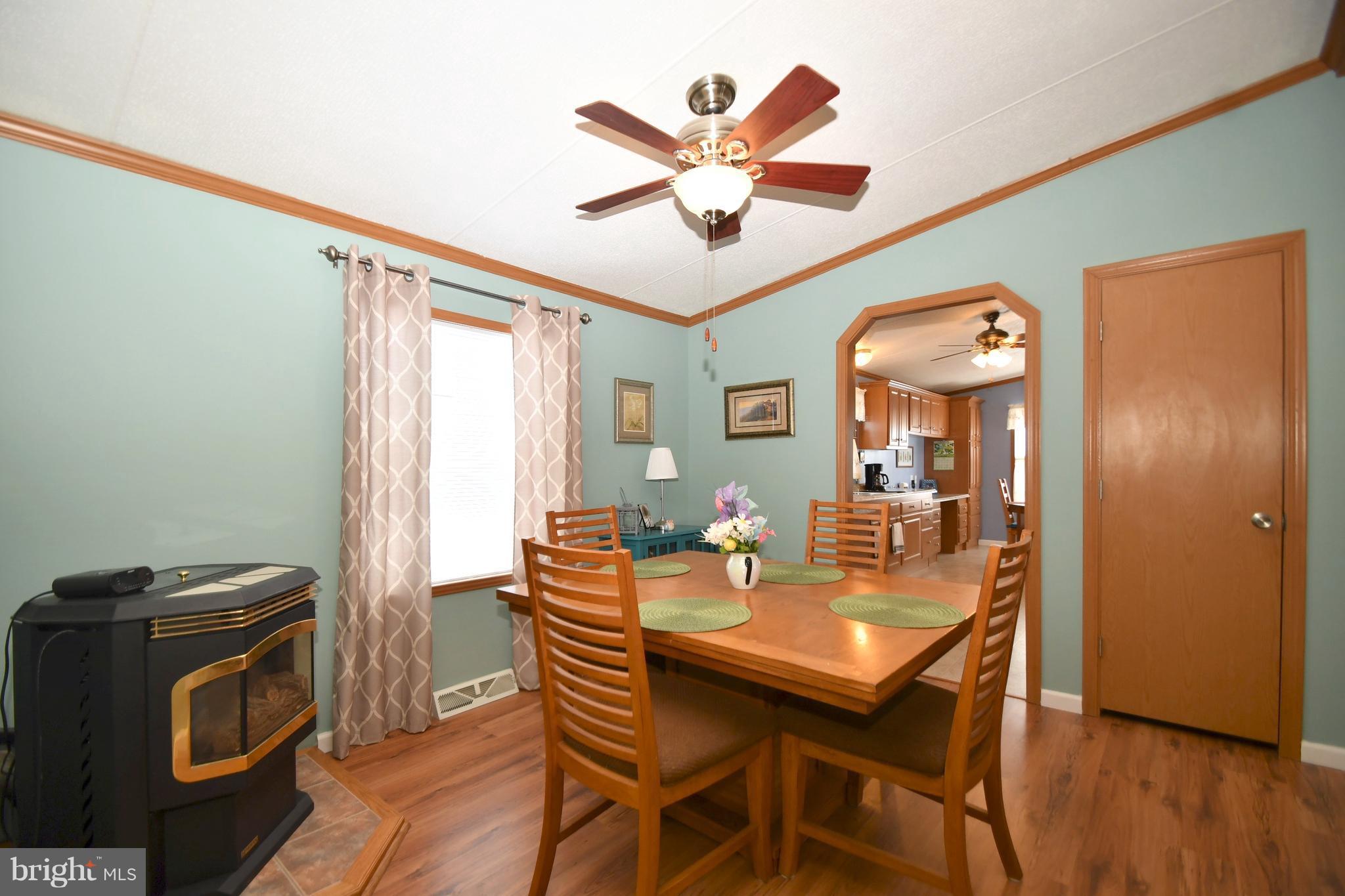 203 Bengies Road Middle River, MD 21220 - Photo 7 of 25 Dining Room with Pellet Stove