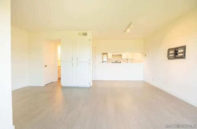 a view of a swimming pool with an outdoor seating