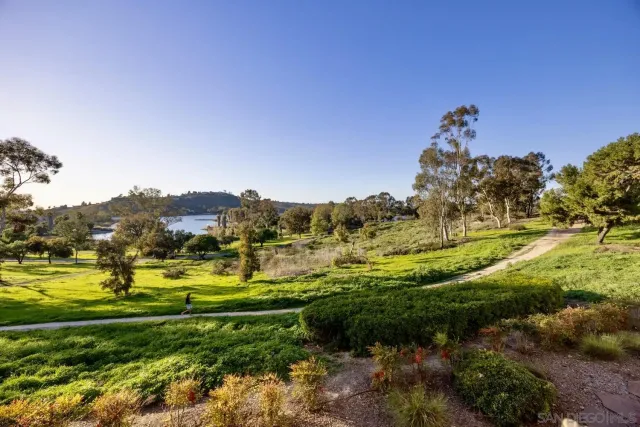 a view of a swimming pool with lounge chairs