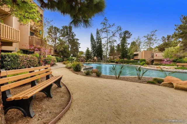 a view of swimming pool with a yard