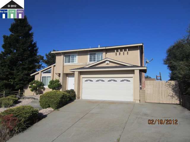 199 Iris Road Hercules, CA 94547 - Photo 1 of 1 a front view of a house with a yard