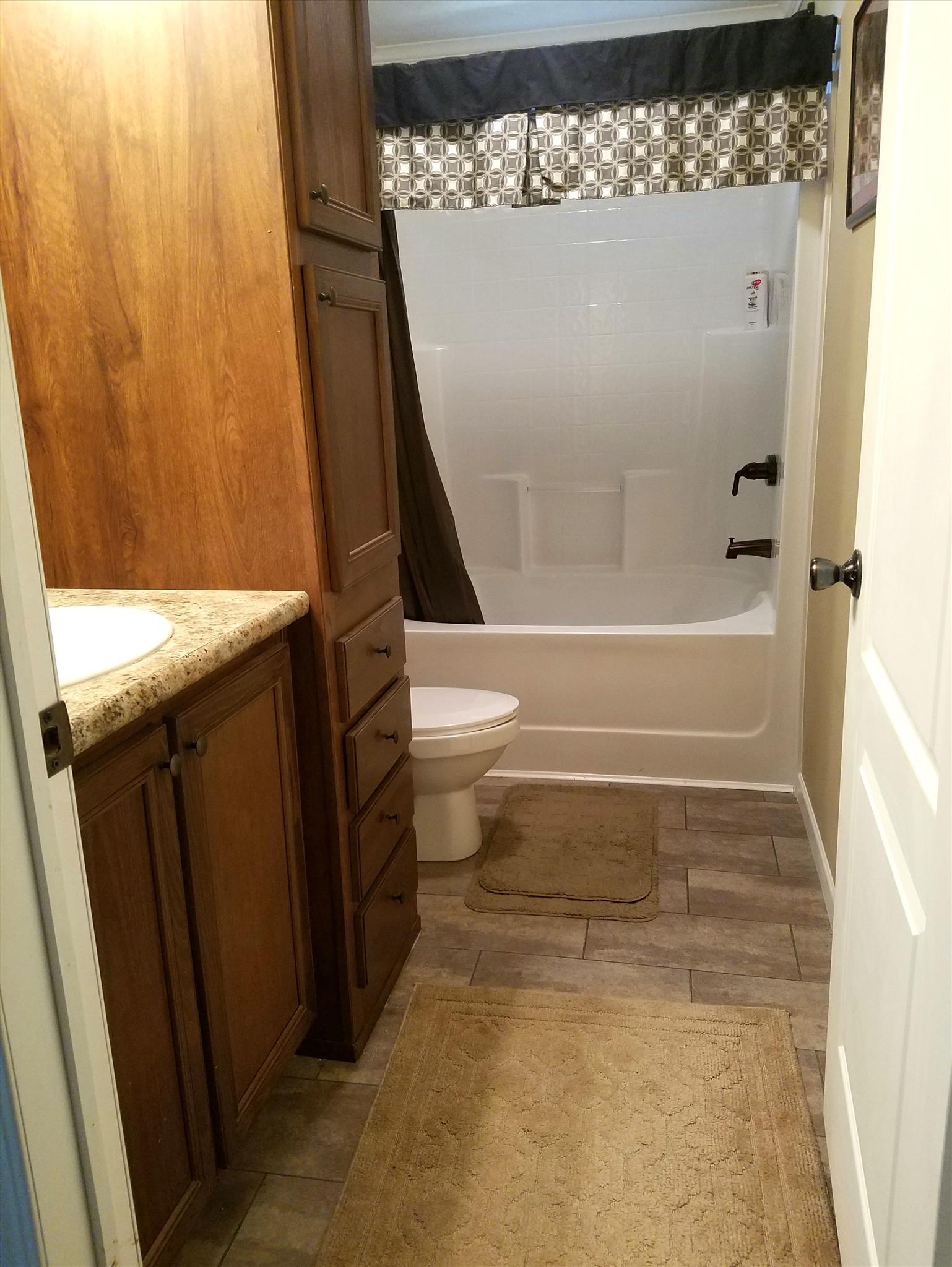 6363 Gordon Lawrence Road Santa Fe, TN 38482 - Photo 11 of 20 a bathroom with a toilet and a shower