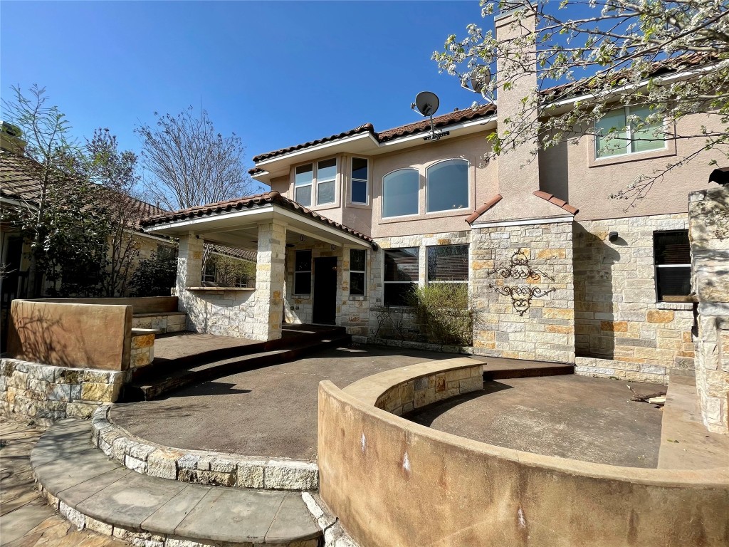 3713 Broadwinged Hawk Cove Austin, TX 78738 - Photo 36 of 37 a view of a white house with a sink and sitting area