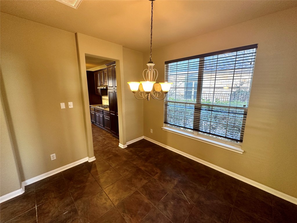 3713 Broadwinged Hawk Cove Austin, TX 78738 - Photo 6 of 37 a view of an empty room with a window