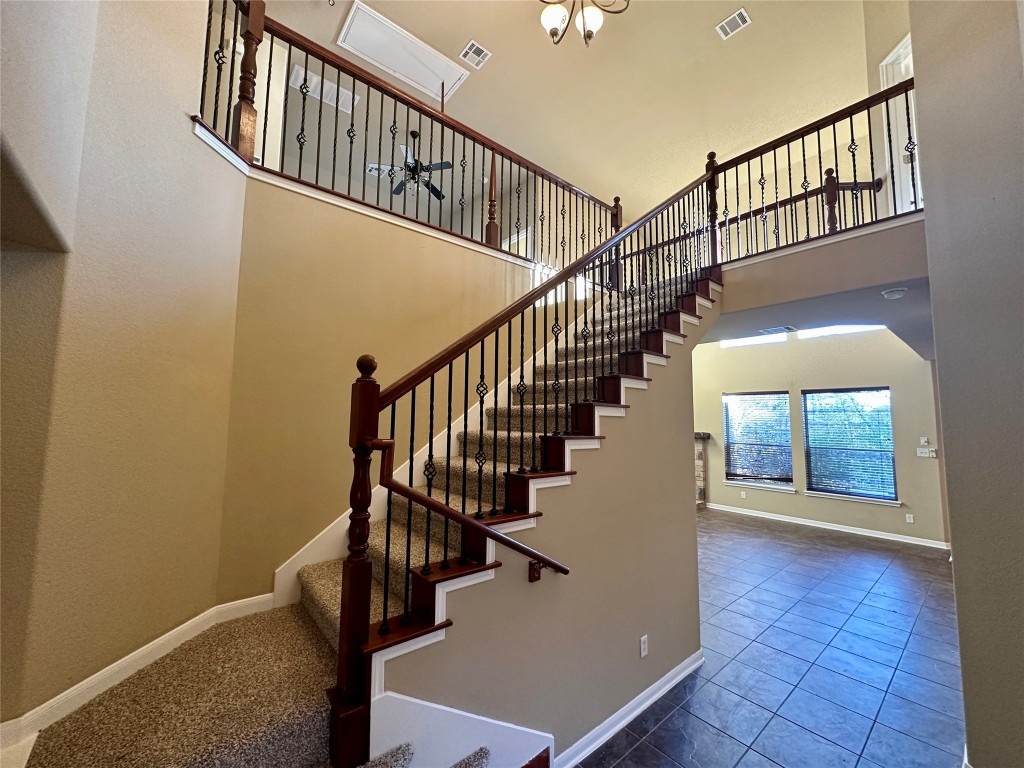 3713 Broadwinged Hawk Cove Austin, TX 78738 - Photo 7 of 37 a view of entryway and hall with wooden floor