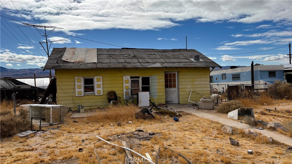 733 Ranch Road Daggett, CA 92327 - Photo 1 of 1 a view of a backyard with a patio