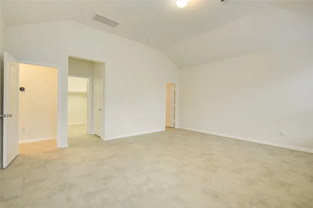 an empty room with an entryway