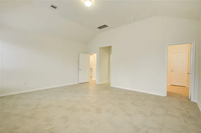 an empty room with an entryway