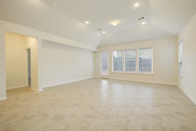 an empty room with windows