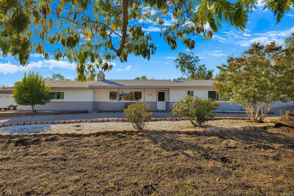 1427 Keyser Road Ramona, CA 92065 - Photo 1 of 1 a front view of a house with garden