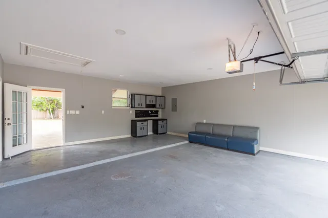 a room with furniture and window