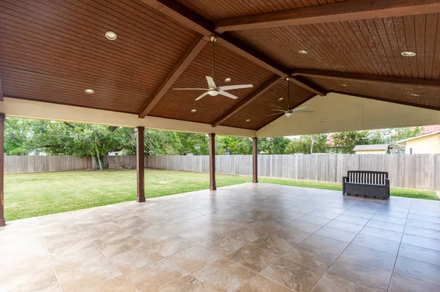 a view of a backyard of the house