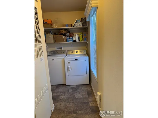 a bathroom with a toilet a sink and a shower