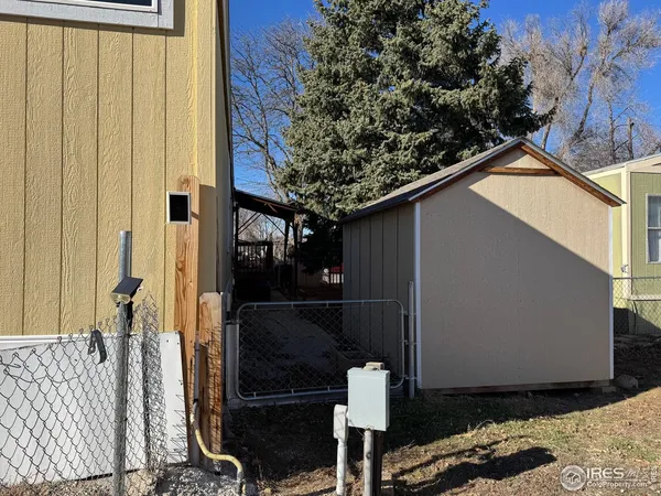 a view of empty room and wooden floor