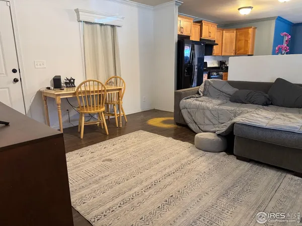 a bedroom with a bed and a television in it
