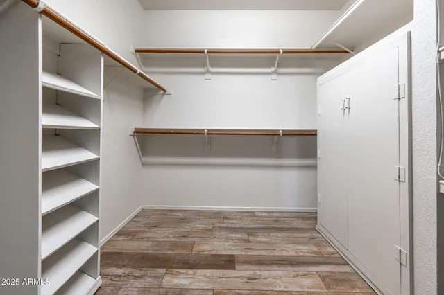 a view of an empty walk in closet