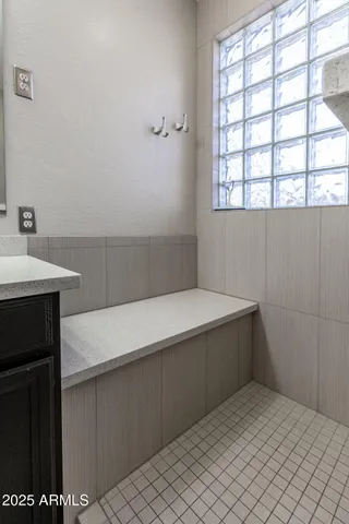 a bathroom with a sink and a vanity