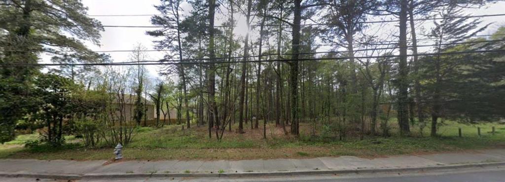 5395 Feldwood Road South Fulton, GA 30349 - Photo 1 of 3 a view of a yard with a barn in the background