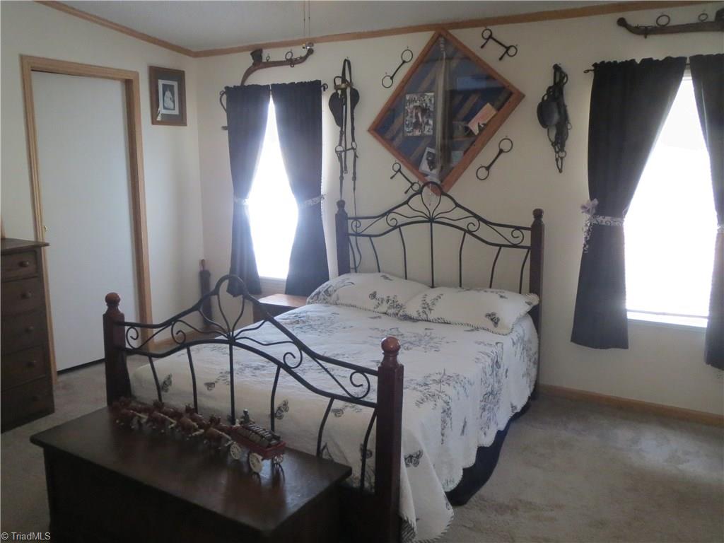 123 Industrial Road Elkin, NC 28621 - Photo 11 of 27 Master bedroom.