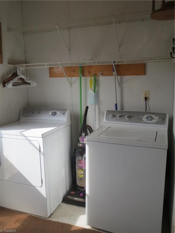 123 Industrial Road Elkin, NC 28621 - Photo 18 of 27 Laundry room located on the main level off the kitchen.