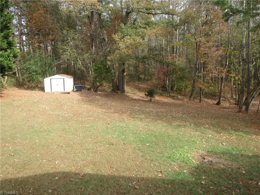 123 Industrial Road Elkin, NC 28621 - Photo 19 of 27 View of property and storage shed.