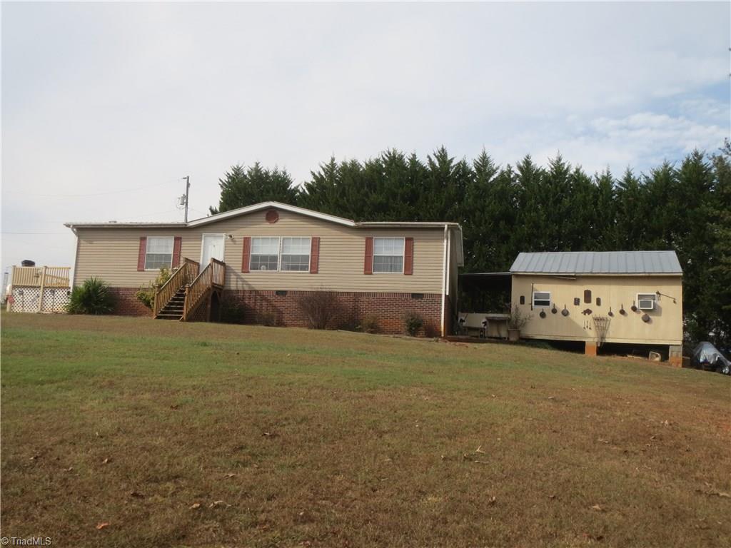 123 Industrial Road Elkin, NC 28621 - Photo 4 of 27 Front view of home and workshop.
