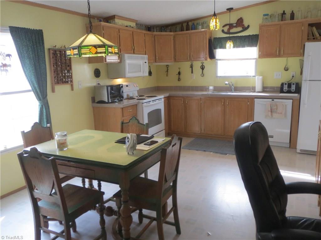 123 Industrial Road Elkin, NC 28621 - Photo 7 of 27 View of kitchen from living room.