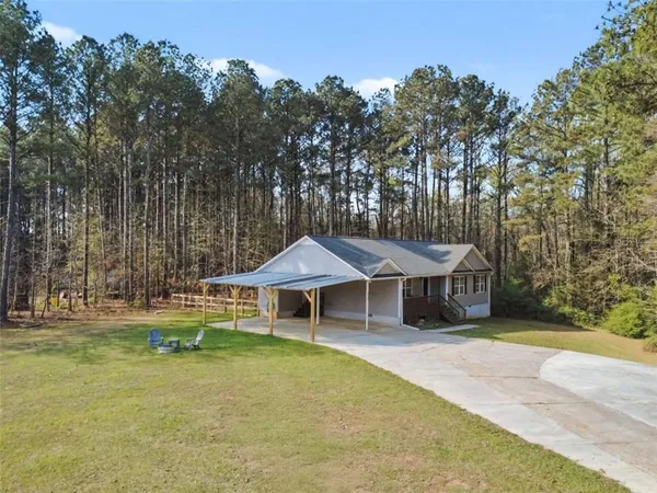 a house with trees in front of it