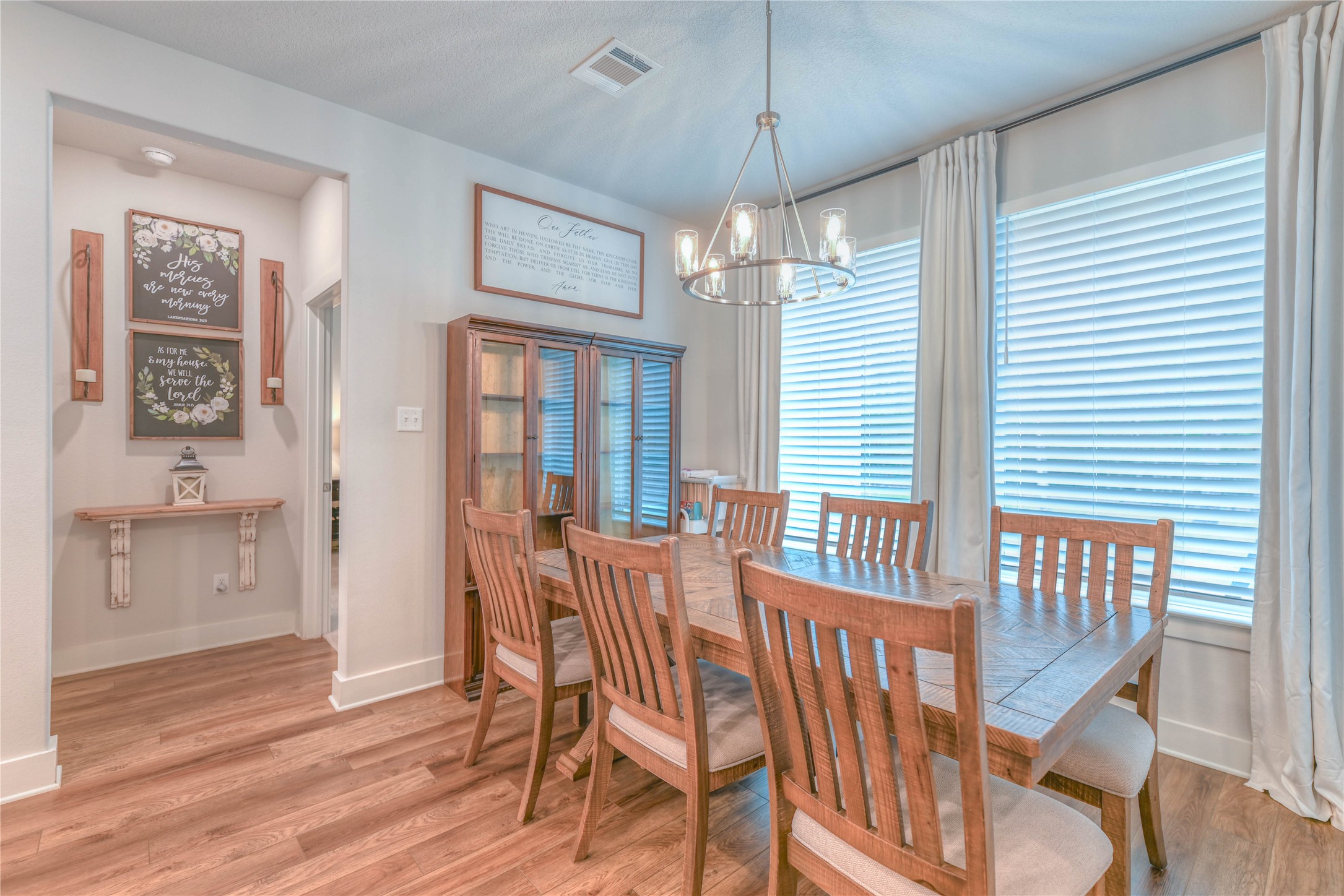 786 Farm To Market 230, Unit C Trinity, TX 75862 - Photo 16 of 41 a view of a dining room with furniture window and wooden floor